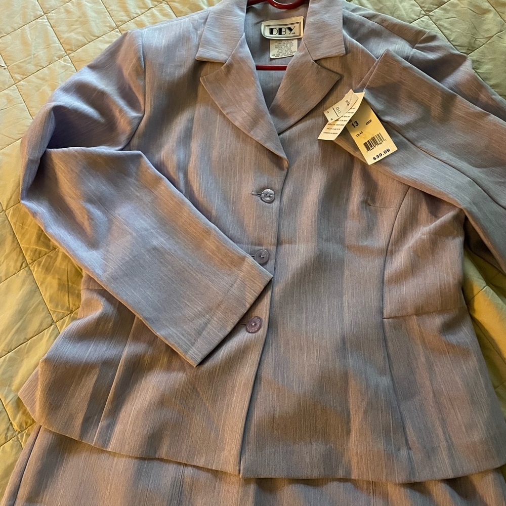 2 piece light purple suit. Size 13/14